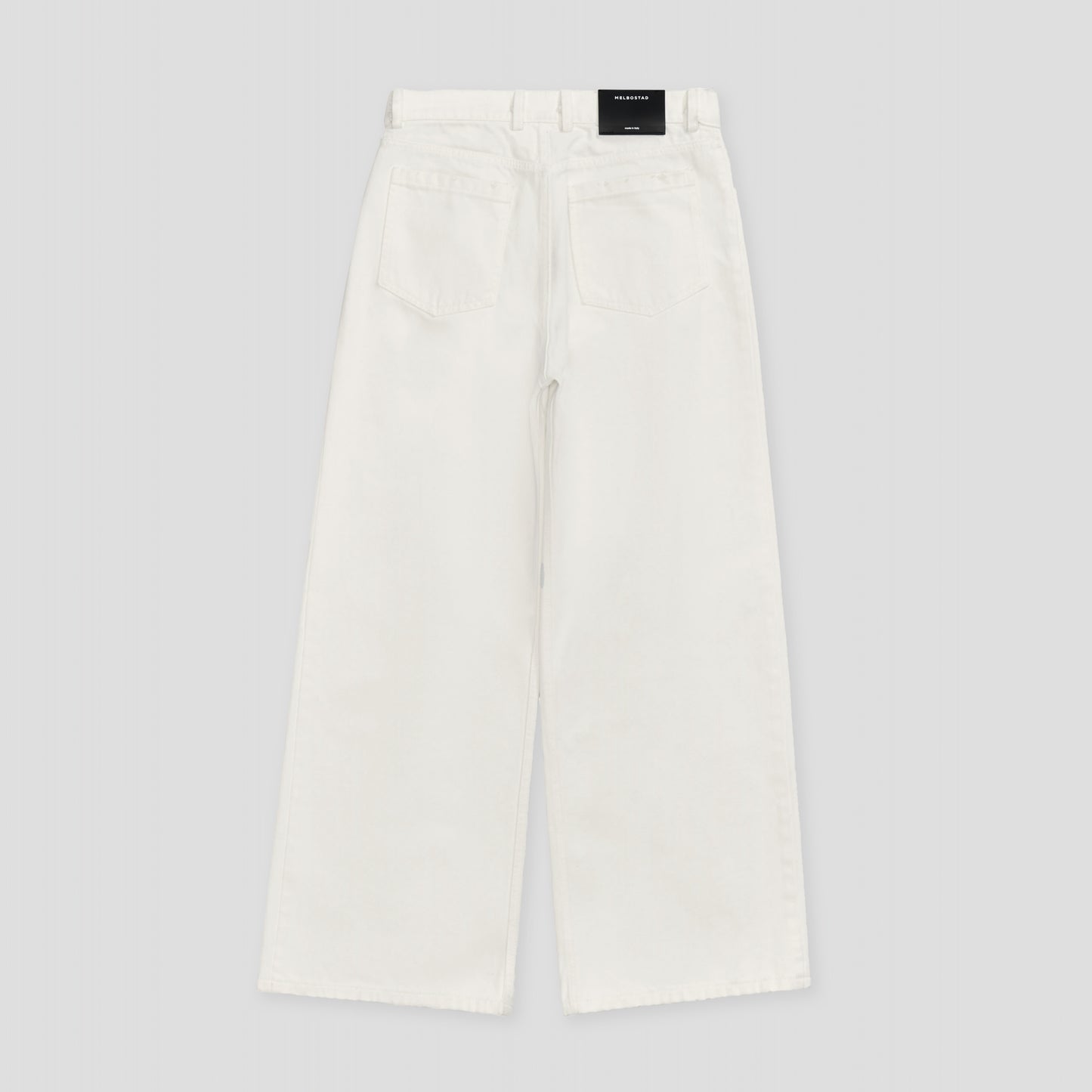 WHITE VINTAGE WASHED PLEATED SLOUCHY JEANS IN ORGANIC COTTON DENIM