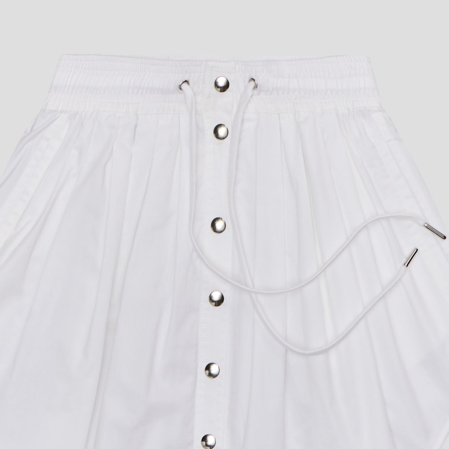 WHITE SNAP FRONT DRAWSTRING MINI SKIRT IN ORGANIC COTTON