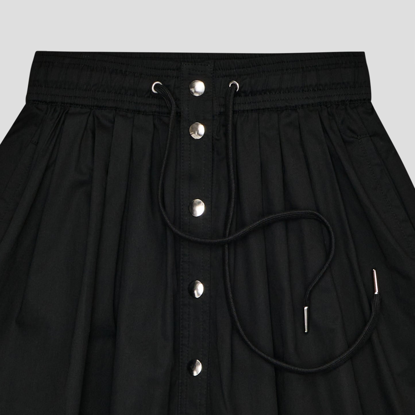 BLACK SNAP FRONT DRAWSTRING MINI SKIRT IN ORGANIC COTTON